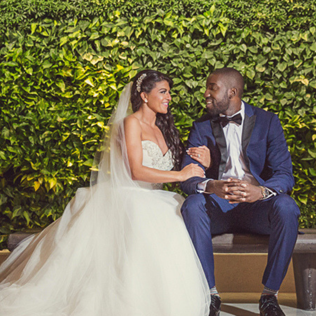 bride and groom smile at each other at epic hotel in miami