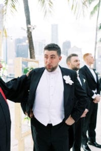 groom's reaction to bride walking down the aisle