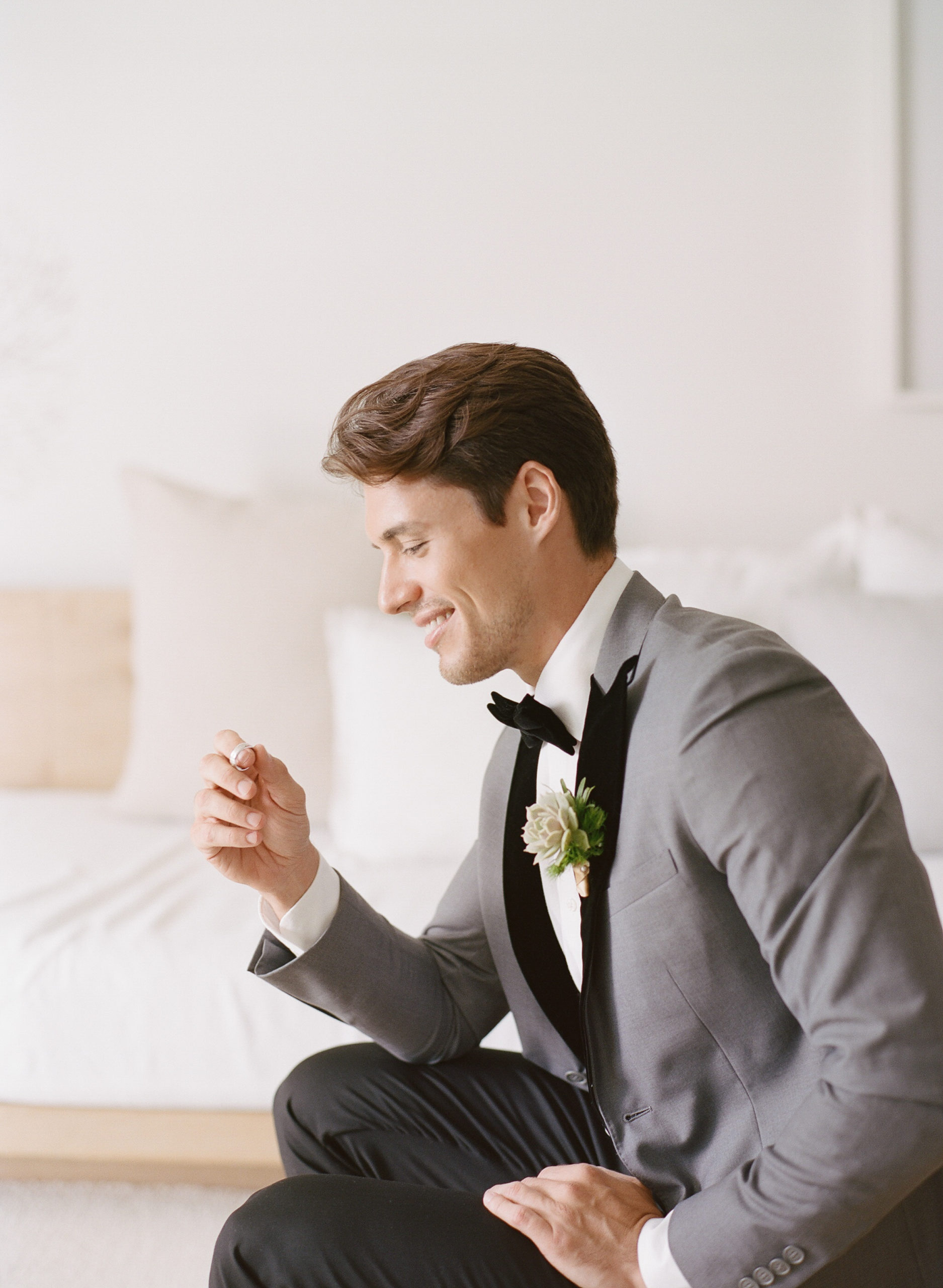 Must have photo of the groom while he is getting ready