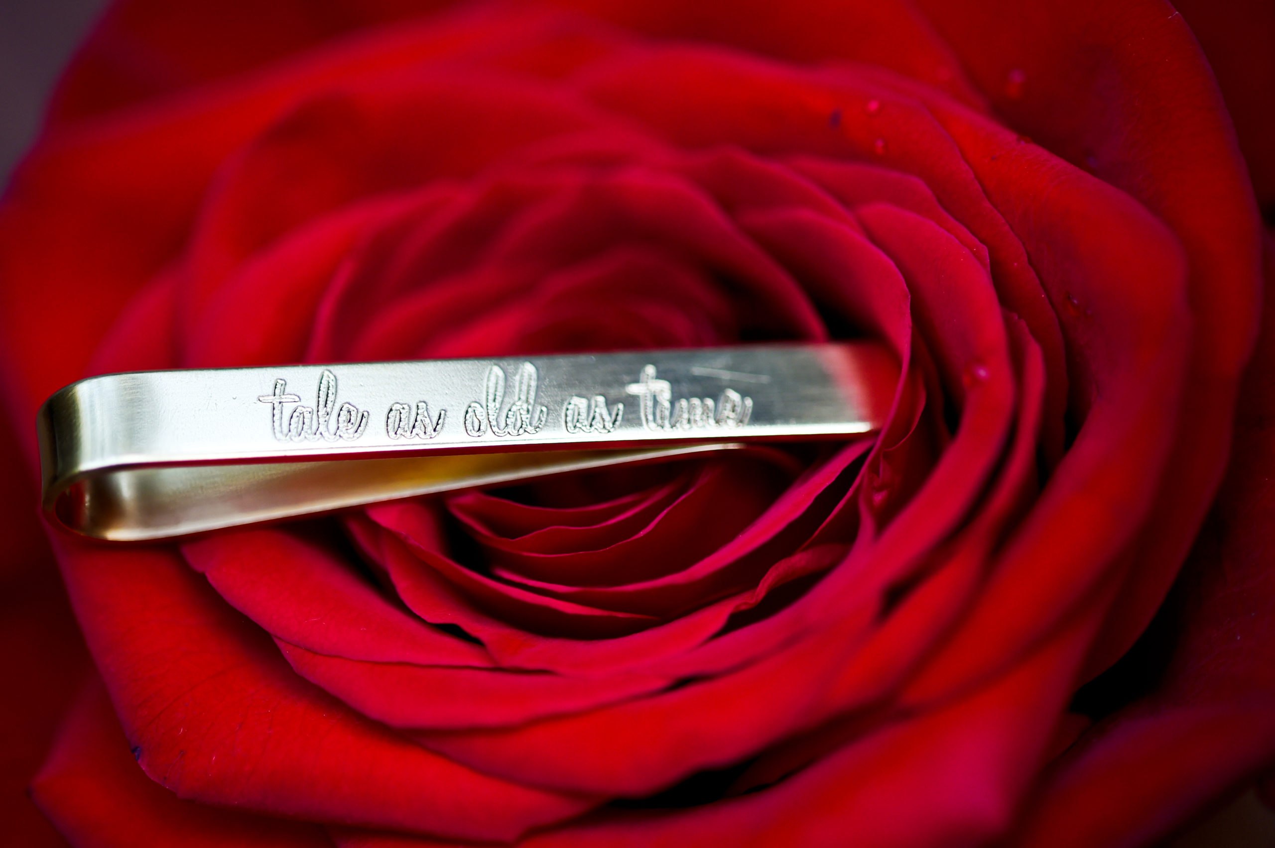 Ways to incorporate Disney wedding ideas into your big day. The Beauty and the Beast wedding featured hidden details like the "Tale as old as time" tie clip!