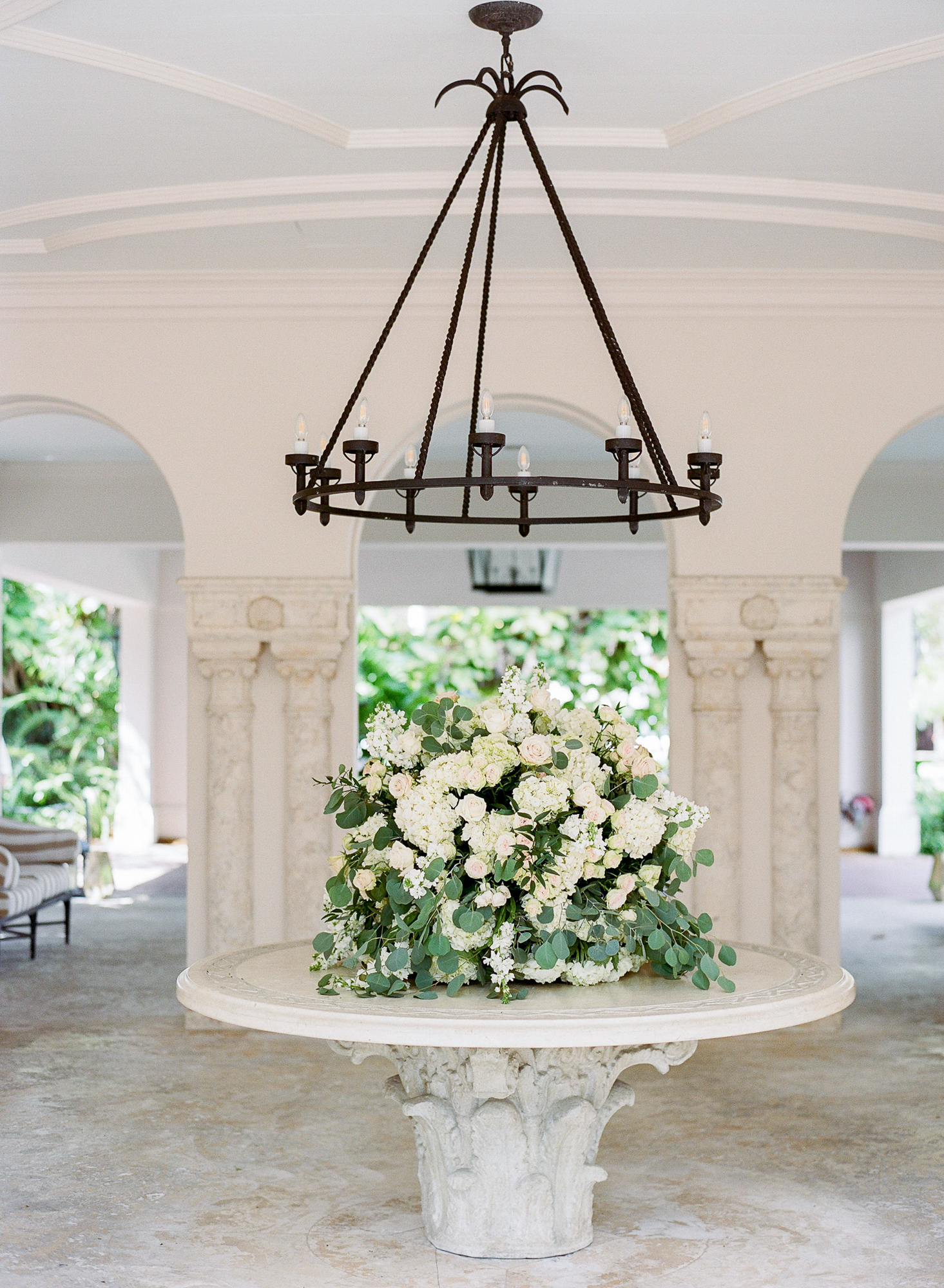 Petal Productions created an enormous floral piece for the welcome table at Fisher Island Club, you'd never know that this Florida wedding took place in the heart of Miami!