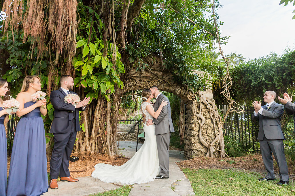The bride and groom had their ceremony in the backyard of the Curtiss Mansion