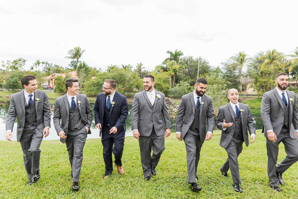 The groomsmen took a fun photo while laughing