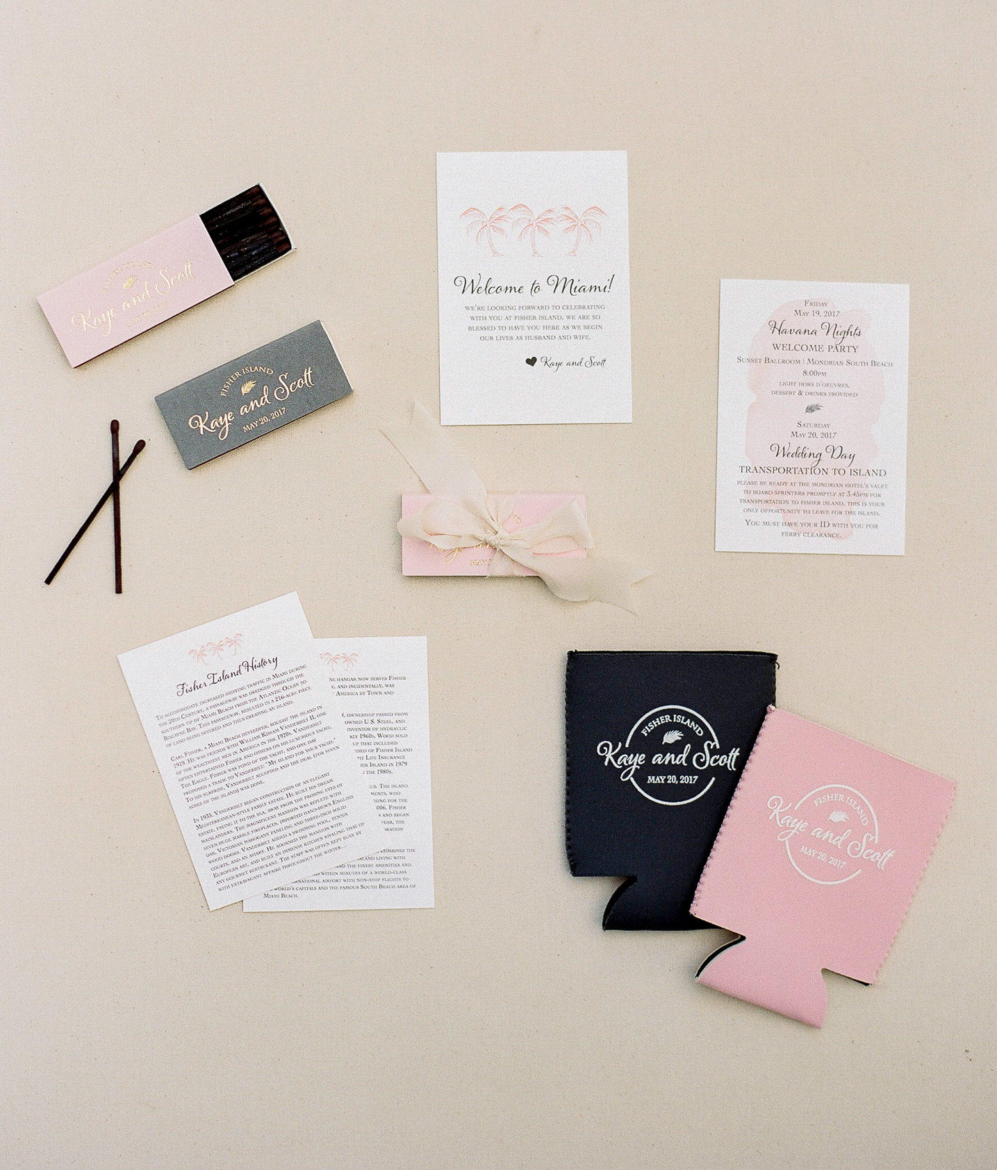 The welcome bags were filled with custom match boxes and matching custom koozies in the wedding colors of pink and gray