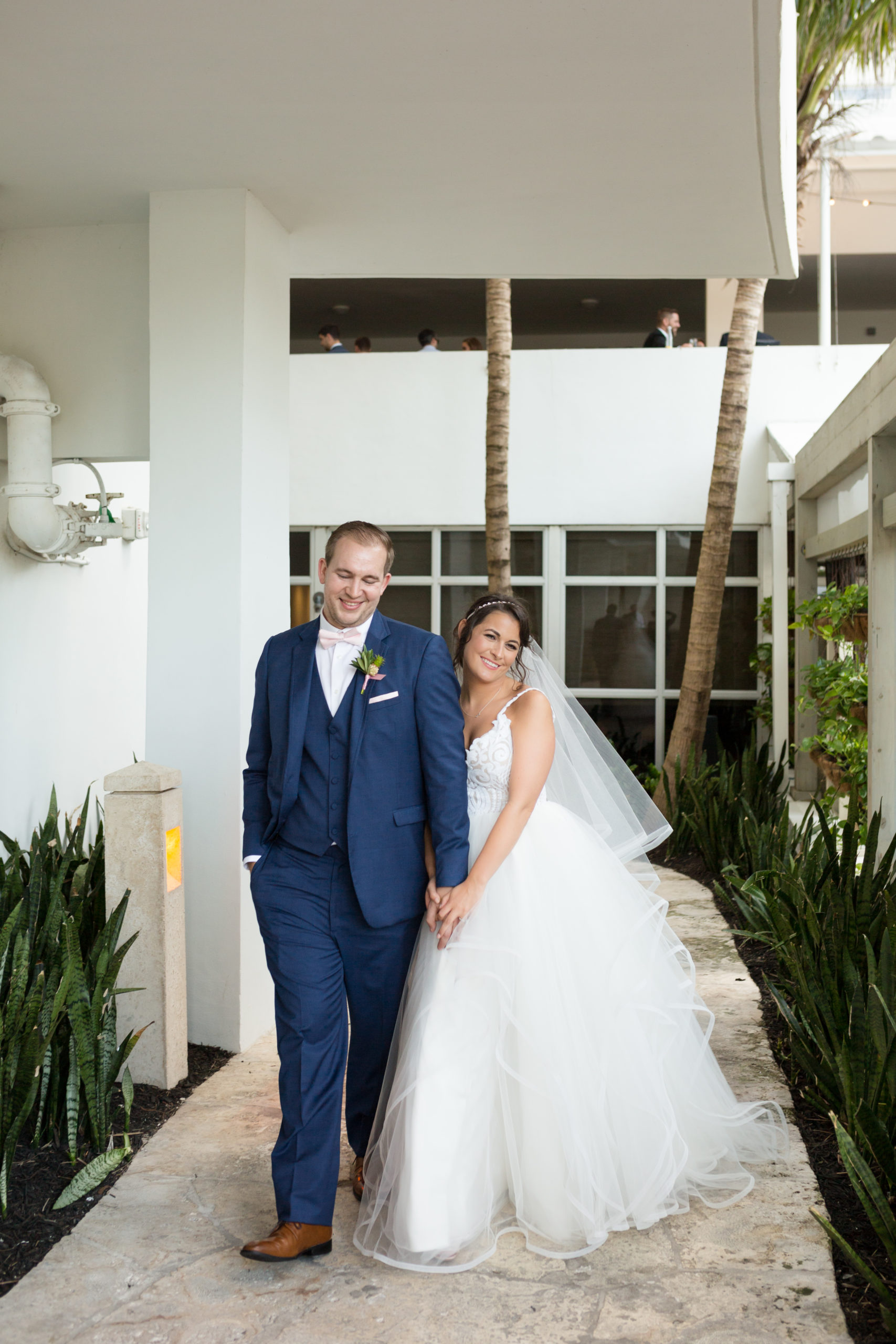Adorable bride and groom photo posing together at The Confidante in Miami Beach, wedding planned by Oh My Occasions
