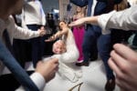 bride showing off her dance moves on the dance floor
