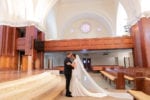 bride and groom have their first look in their church