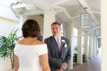 the groom reacts to seeing the bride during their first look