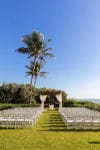 lawn ceremony at LaPlaya in Naples, Florida with a draped chuppah