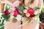 fuschia, purple, peach, and salmon bouquets with blush bridesmaids dresses
