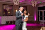 bride and groom laugh during their thank you to guests at La Playa Naples