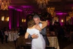 bride and groom hug during their first dance at La Playa Naples