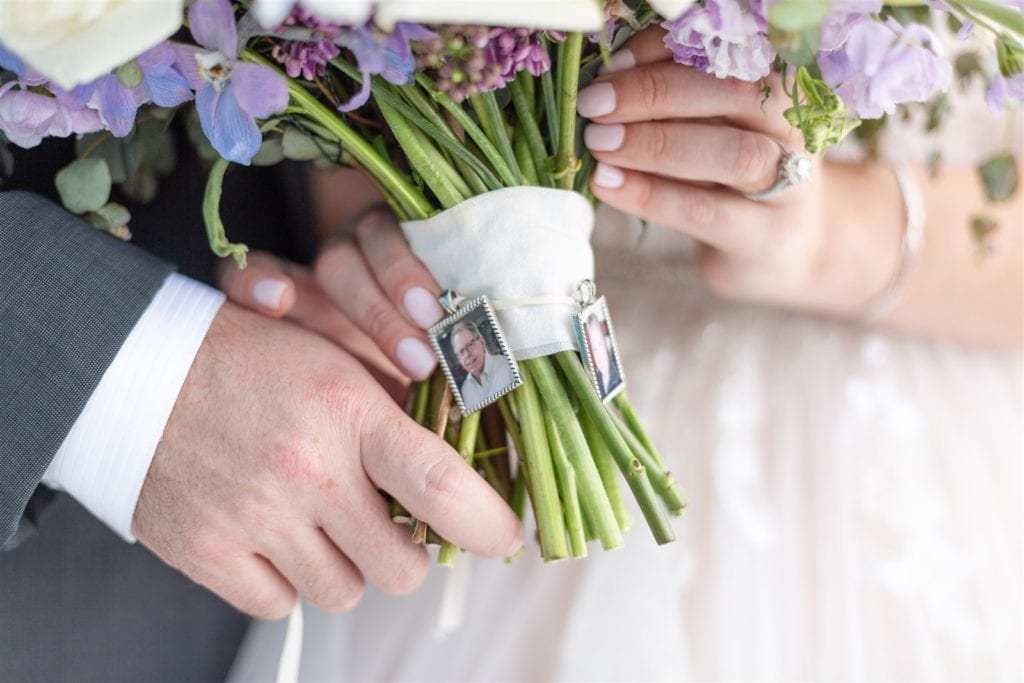 bridal bouquet with photo charms of late loved ones