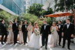 east miami wedding bridesmaids and groomsmen walk on the terrace
