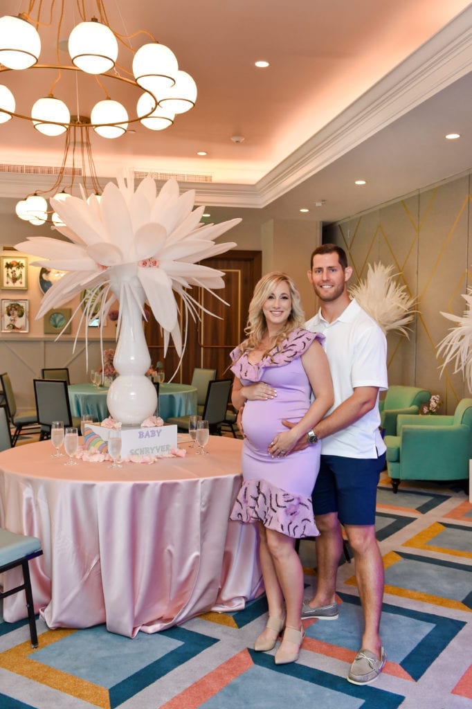 Dr. Seuss themed baby shower Oh The Places You’ll Go with pink satin linen and foam centerpiece