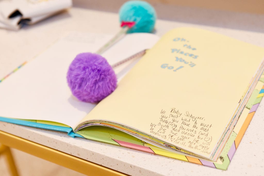 Dr. Seuss themed baby shower Oh The Places You’ll Go with a guest book sign in