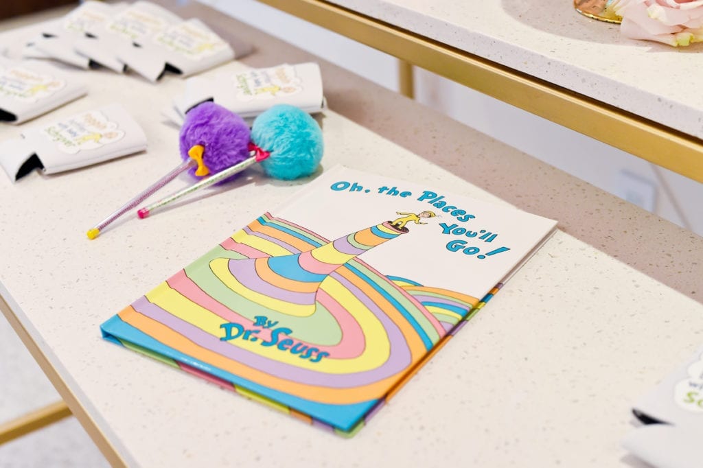 Dr. Seuss themed baby shower Oh The Places You’ll Go baby shower with a guest book sign in