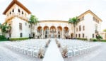 biltmore coral gables wedding with blush draped chuppah with pampas grass and blush flowers with white stage