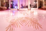 white dance floor wrap with gold monogram in Biltmore Miami wedding country club ballroom