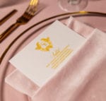 gold flatware and gold rim charger plate with gold ink menu and blush velvet napkins Biltmore Miami wedding