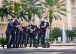 groom and groomsmen funny photo on a scooter outside biltmore coral gables
