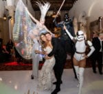 bride and groom hugging with darth vader and storm trooper