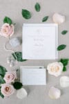 letterpress wedding invitation in white and champagne with blush roses