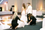 oh my occasions assists bride and groom before their jw marriott miami wedding ballroom reveal