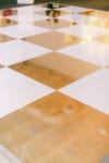 gold and white checkerboard dance floor wrap