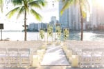 beach ceremony with unique orchid structure at mandarin oriental miami wedding