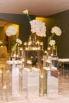 mirror pedestal unique escort card display with white orchids and calla lilies at mandarin oriental miami wedding