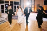 mandarin oriental miami wedding with oh my occasions wedding planners guiding bride and groom onto dance floor for ballroom reveal