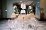 mandarin oriental miami wedding with glass pedestal donut display salty donut miami with calla lilies and orchids