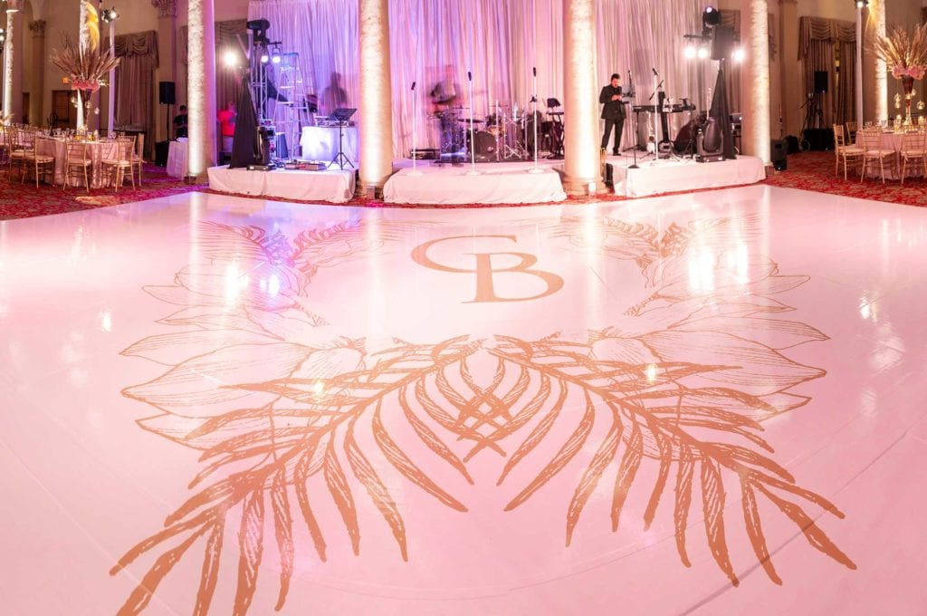 Floor wrap design with couples initials and pampas pattern at The Baltimore Hotel in Miami Coral Gables, wedding planned by Oh My Occasions
