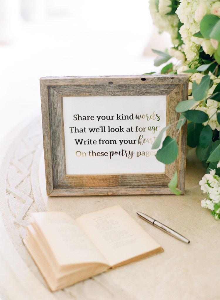 Photo of book and note for guests to write messages as they enter.