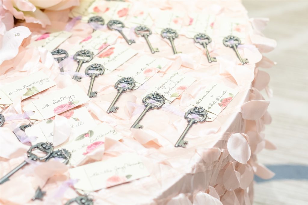 vintage key escort cards with calligraphy tags at The Conrad Fort Lauderdale Beach, wedding planned by Oh My Occasions