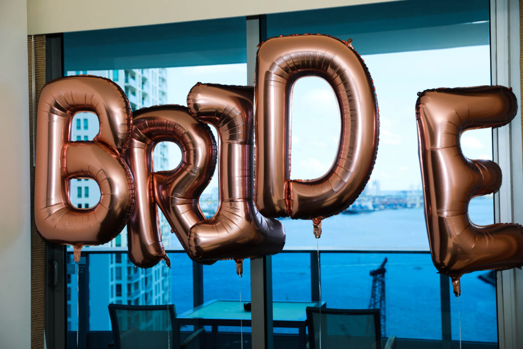 Bride letters blow up balloons in rose gold at the Kimpton EPIC Hotel, planned by Oh My Occasions