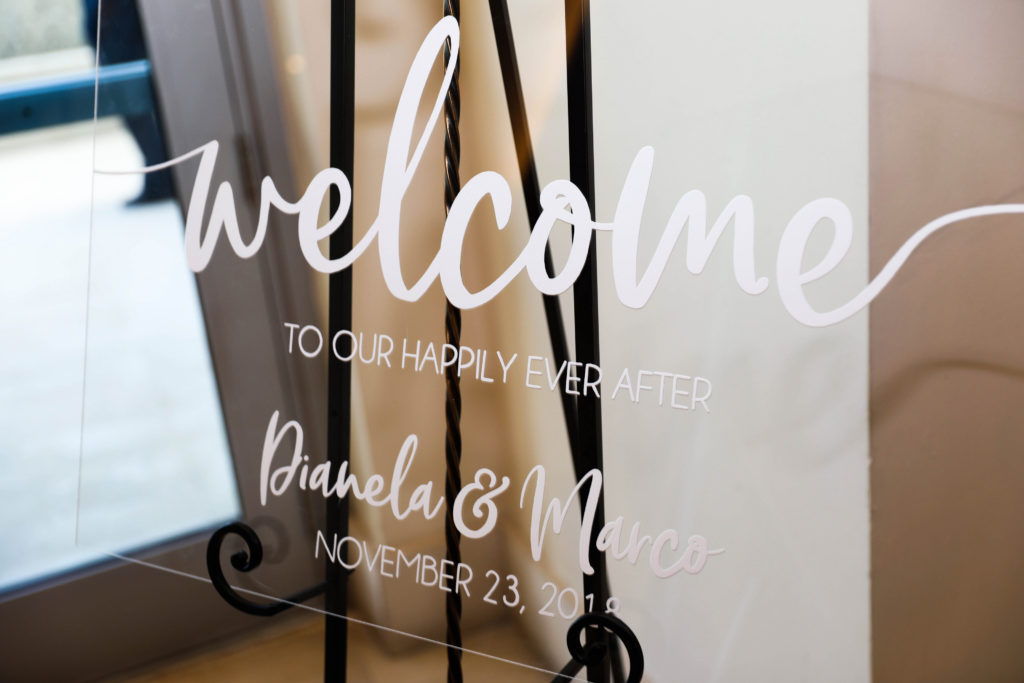 Transparent acrylic welcome sign at the Kimpton EPIC Hotel, planned by Oh My Occasions