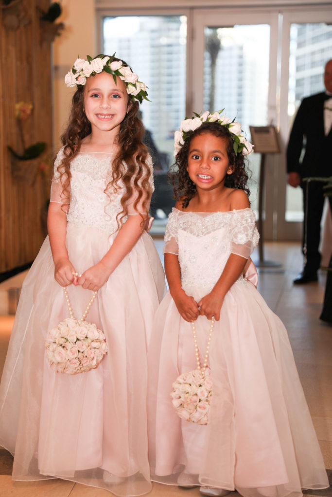 Two beautiful flower girls at the Kimpton EPIC Hotel, planned by Oh My Occasions