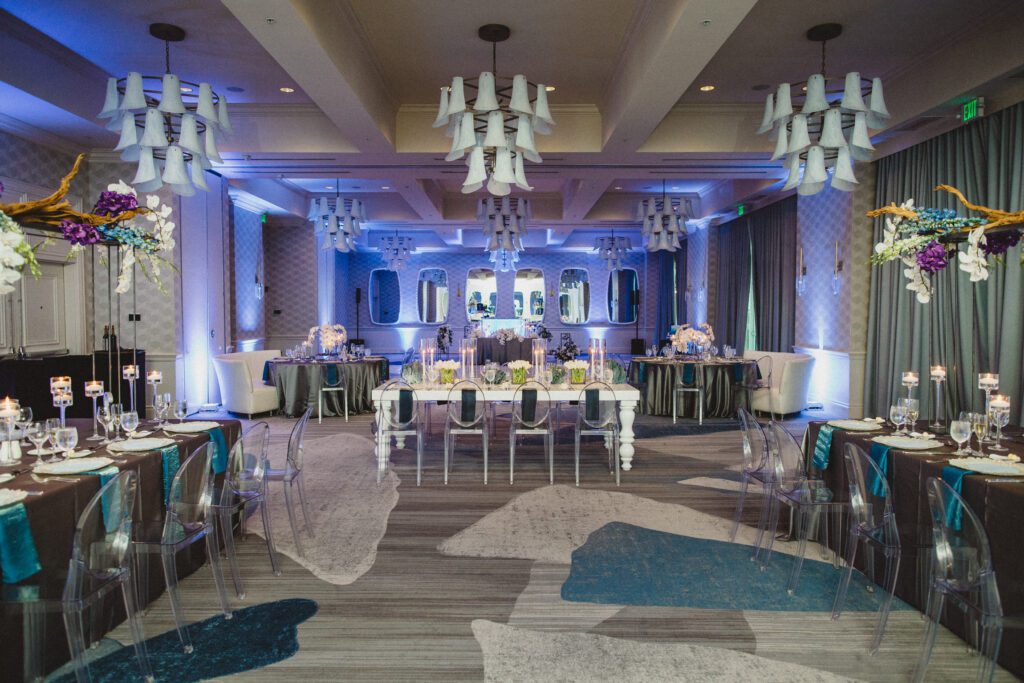 a dinner setup with sofas at La Playa Golf and Beach Resort in Naples Florida