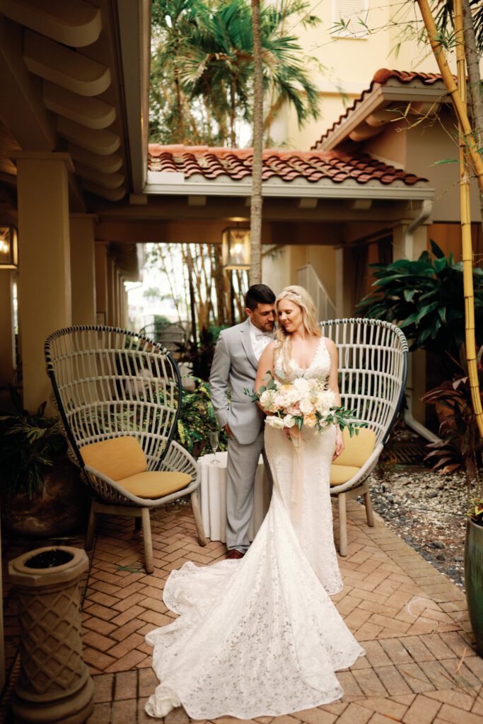 a bride and groom get married at La Playa Golf and Beach Resort in Naples Florida